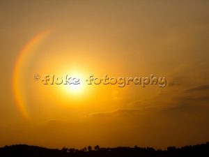 A rainbow surrounding the sun on a beautiful Southern California evening.  Spectacular!  20" x 14".  Printed on Parrot Digigraphic Ultra Lustre paper.  Limited Edition of 25.